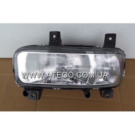 Фара левая Mercedes Atego (с ручным управлением, с рифленным стеклом). TANGDE